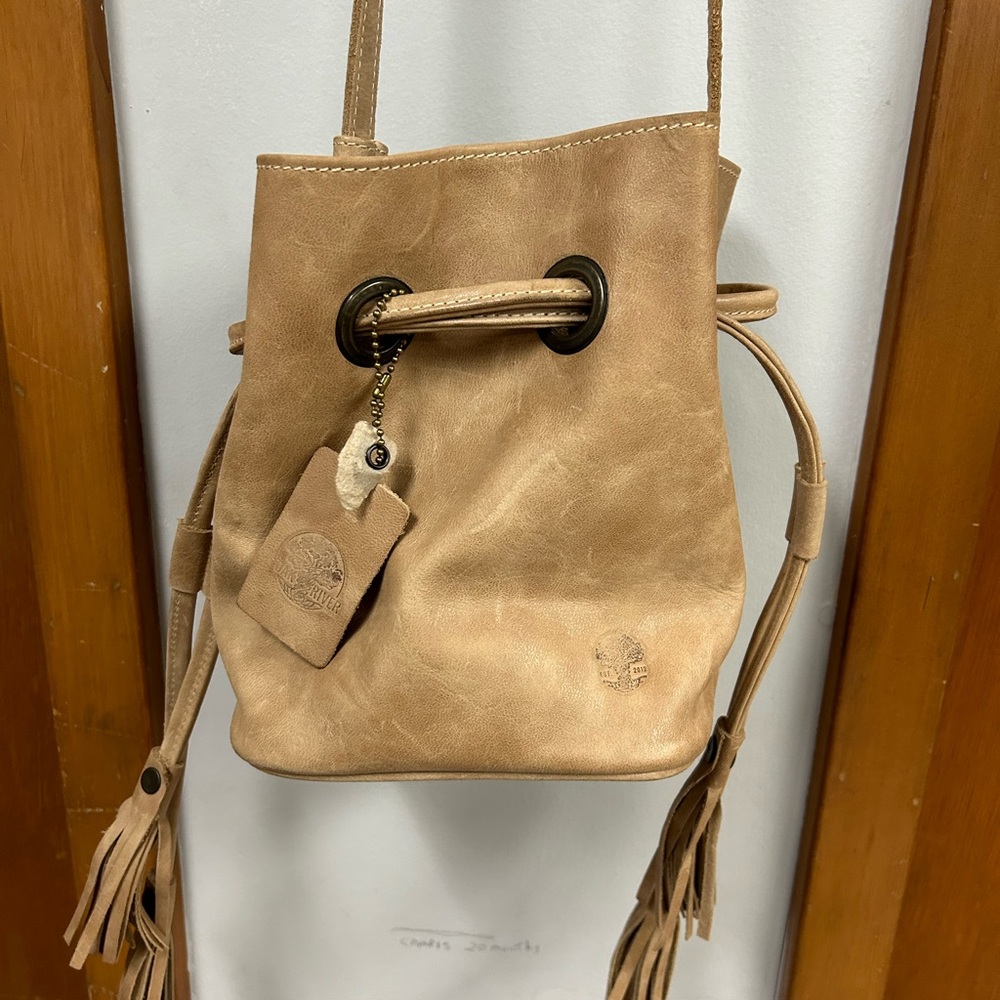 Oak River Crossbody. Never used. It’s still brand new